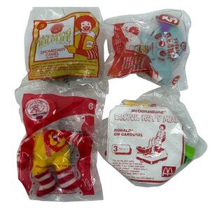 Lot of 4 Happy Meal Toys Ronald McDonald the Bear On Carousel Peanut